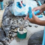 Jak naprawić zatkaną rurę spustową od pralki?